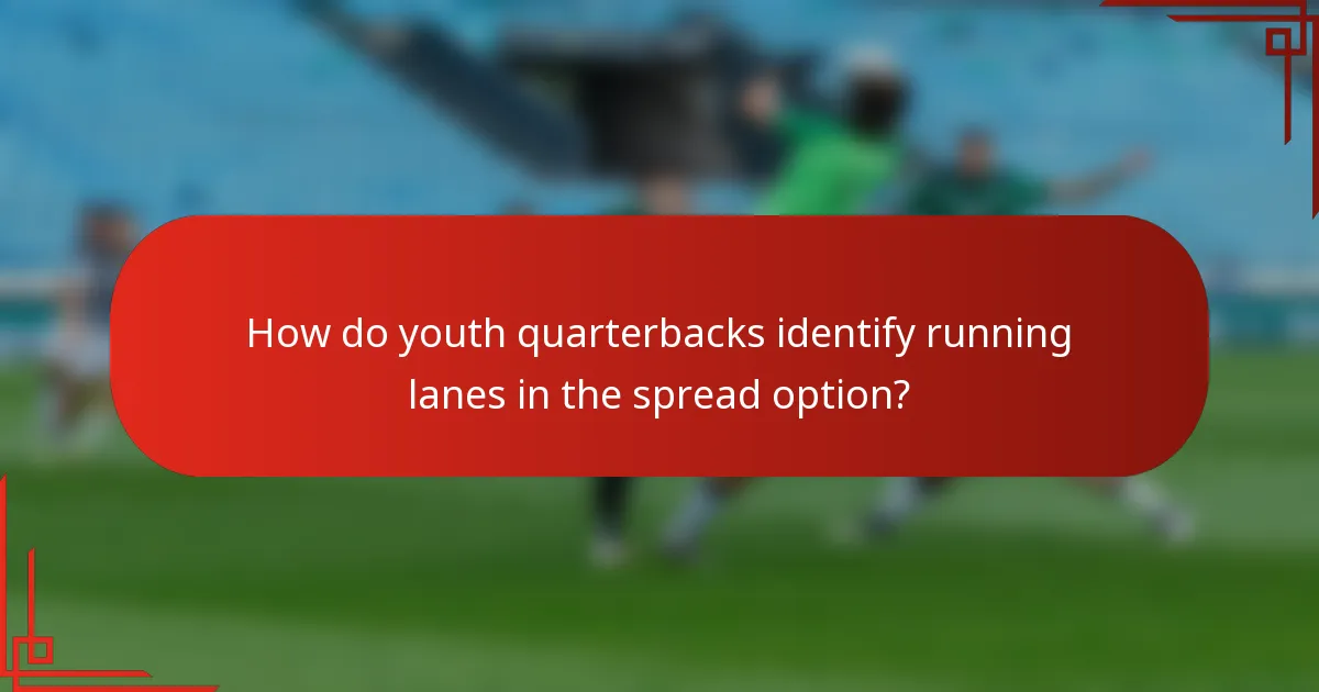 How do youth quarterbacks identify running lanes in the spread option?